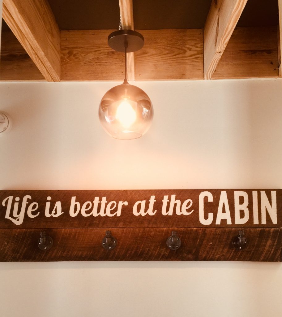 large cabin sign